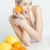 portrait of young woman with citrus fruit stock photo © phbcz