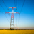 Electricity transmission pylon silhouetted against blue stock photo © pixinoo