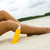 sottile · gambe · immagine · femminile · sabbia · sole - foto d'archivio © pressmaster