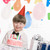 születésnap · ünneplés · portré · vidám · fiú · néz · kamera - stock fotó © pressmaster