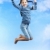 imagem · menina · feliz · saltando · grama · céu · crianças - foto stock © pressmaster