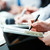 écrit · conférence · homme · d'affaires · mains · documents -  © pressmaster