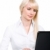 wpisując · portret · blond · kobieta · posiedzenia · laptop - zdjęcia stock © pressmaster