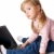 mały · użytkownik · ciekawy · dziewczyna · posiedzenia · laptop - zdjęcia stock © pressmaster