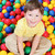 fiú · golyók · boldog · legény · ülő · színes - stock fotó © pressmaster