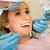 зубов · лечение · изображение · молодые · Lady · стоматолога - Сток-фото © pressmaster