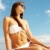 gyönyörű · napozó · kép · női · fehér · bikini - stock fotó © pressmaster