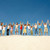 kép · sok · barátok · áll · homokos · tengerpart · karok · a · magasban - stock fotó © pressmaster