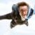 飛行 · 男子 · 圖像 · 年輕 · 商人 · 降落傘 - 商業照片 © pressmaster