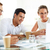 lavoro · di · squadra · ritratto · di · successo · imprenditore · punta · laptop - foto d'archivio © pressmaster
