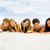 spiaggia · fila · amici · spiaggia · di · sabbia · sorridere - foto d'archivio © pressmaster