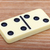 Dominoes on wooden surface close up stock photo © pzaxe