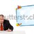 businessman sitting at desk and holding a mobilephone, isolated on white stock photo © ra2studio