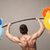 muscular man lifting colorful vitamin weights stock photo © ra2studio