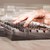 Hand touching keyboard with high tech buttons stock photo © ra2studio