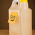 Post-it note with smiley face sticked on gallon stock photo © ra2studio