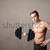 muscular man lifting weights stock photo © ra2studio