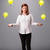 young lady standing and juggling with light bulbs stock photo © ra2studio