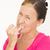 Nervous worried woman biting finger stock photo © roboriginal