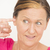 Stressed senior woman finger in ear stock photo © roboriginal