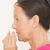 Woman with tissue at nose suffering flu stock photo © roboriginal