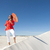 Confident woman on desert sand dune stock photo © roboriginal