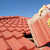 Construction worker tile roofing repair house stock photo © roboriginal