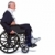 uomo · sedia · a · rotelle · isolato · foto · spingendo - foto d'archivio © RTimages
