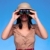 Woman in safari hat looking through binoculars stock photo © RTimages