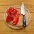 Red pepper sliced with knife on a chopping board stock photo © sarahdoow