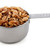 Chopped walnuts presented in an American metal cup measure stock photo © sarahdoow