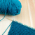 Ball of blue wool with knitting on the needle stock photo © sarahdoow