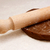 Closeup of rolling pin on gingerbread biscuit dough stock photo © sarahdoow