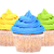Three cupcakes with yellow, blue and green icing stock photo © sarahdoow