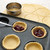 Cutting and filling pastry shapes to make jam tarts  stock photo © sarahdoow