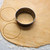 Metal cutter cutting out circles of pastry for jam tarts stock photo © sarahdoow