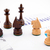Chess pieces on business background. Company strategic behavior stock photo © simpson33