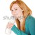 Young woman drinking from a water bottle stock photo © soupstock