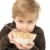 Young  boy holding a bowl of cereal stock photo © soupstock