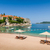 Adriatic sea luxury sand beach with chaise-longue chairs and umbrellas stock photo © Steffus