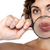 Lady holding magnifying glass in front of her lips stock photo © stockyimages