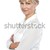 Side pose of a pretty business professional stock photo © stockyimages