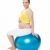 Relaxed pregnant woman sitting on pilate ball stock photo © stockyimages