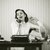 Woman talking on phone at desk stock photo © stokkete