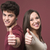 Happy young couple thumbs up stock photo © stokkete