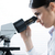 vrouwelijke · onderzoeker · microscoop · laboratorium · arts - stockfoto © stokkete
