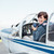 pilóta · repülőgép · pilótafülke · mosolyog · női · fény - stock fotó © stokkete