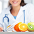 Ernährungsberaterin · Arzt · weiblichen · Büro · Schwerpunkt · Obst - stock foto © stokkete