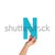 hand holding up the letter N from the bottom stock photo © stryjek