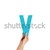 hand holding up the letter V from the bottom stock photo © stryjek